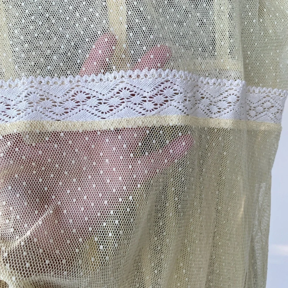 Elegant Cream Lace Dress by Free People size medium.